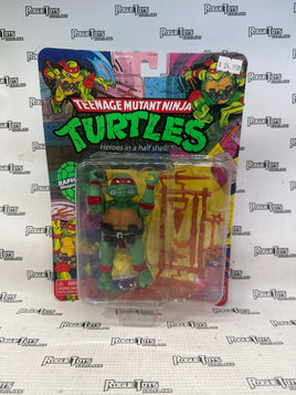 Playmates Teenage Mutant Ninja Turtles Classic Reissue Raphael action figure.