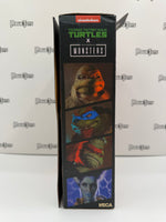 NECA Teenage Mutant Ninja Turtles (TMNT) x Universal Monsters Michelangelo as The Mummy Ultimate Action Figure