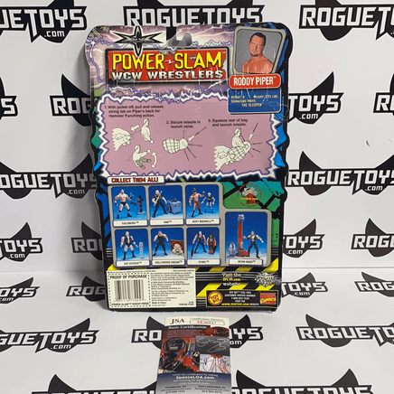 ToyBiz Power Slam WCW Wrestlers Roddy Piper with Missile Firing Bag Pipes and Hammer Punching Action Autographed - Rogue Toys