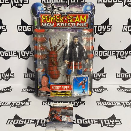 ToyBiz Power Slam WCW Wrestlers Roddy Piper with Missile Firing Bag Pipes and Hammer Punching Action Autographed - Rogue Toys